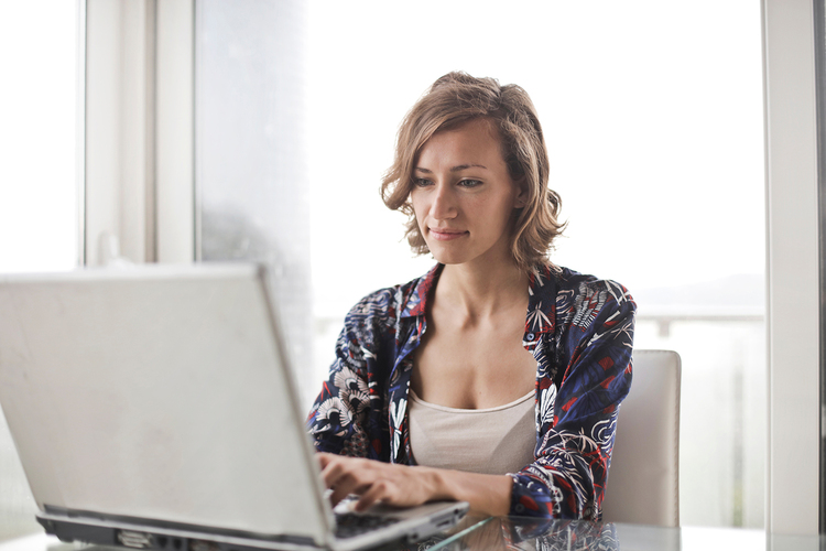 Canva   Woman In Blue Floral Top Sitting While Using Laptop Blog Pic